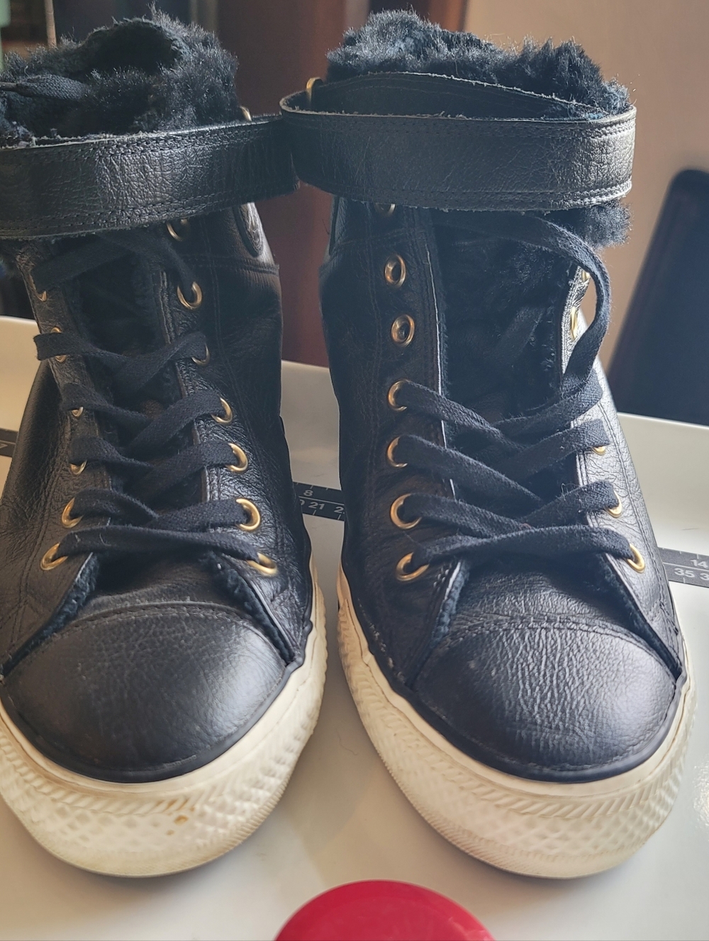 Converse Women's Brea Leather High-Top Leather Sneakers with Faux Fur Lining.